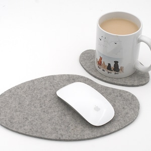 May include: Two gray felt coasters, one with a white mug with a dog illustration and the other with a white wireless mouse. The mug has the text "We love you, Mum"