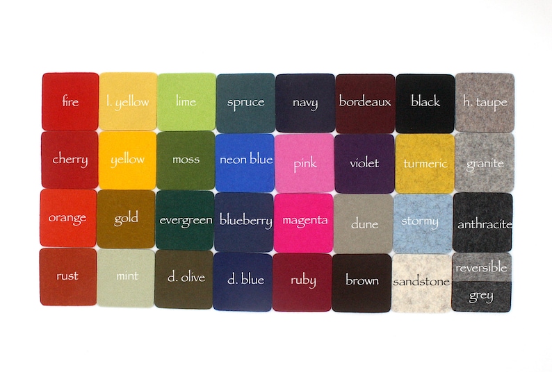 May include: A set of 40 felt squares in various colours, each with a colour name written in white text. The colours include fire, yellow, lime, spruce, navy, bordeaux, black, taupe, cherry, yellow, moss, neon blue, pink, violet, turmeric, granite, orange, gold, evergreen, blueberry, magenta, dune, stormy, anthracite, rust, mint, olive, blue, ruby, brown, sandstone, and grey.