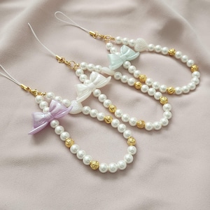 Pearl wristlet/bow charms/phone chain/small gift ideas/womens charms/gifts for her/camera lanyard/wristlet/special gifts/phone lanyard