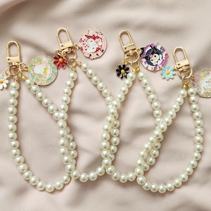Kitty charms/phone charms/cinnamaroll/kuromi/lanyard/gift ideas/gifts for her/trending/laptop/pochacco/sanrio inspired/wristlet/pearls