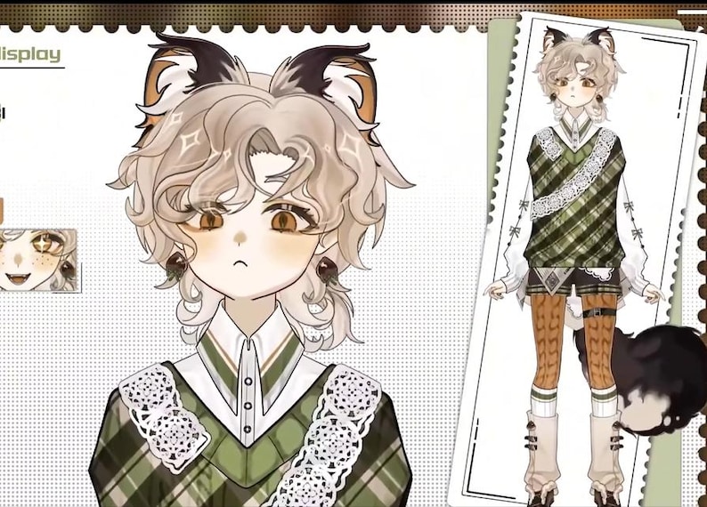 Op de afbeelding: Een cartoonillustratie van een persoon met bruin haar en kattenoren die een groen-wit geruite trui draagt met een witte kantversiering. De persoon heeft een lichtbruine huidskleur en bruine ogen.