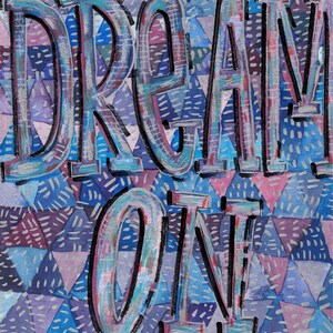 May include: A hand-painted artwork featuring the text DREAM ON in large, blocky, light blue and white letters with black outlines. The background consists of a repeating pattern of small triangles in shades of blue, purple, and pink, each filled with short, dashed white marks.