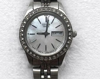 Citizen Ladies Watch Crystal Swarovski Bezel Silver Tone Day Date Dress Watch