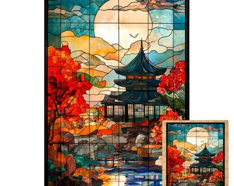 May include: A stained glass art puzzle featuring a Japanese pagoda with a full moon in the background. The pagoda is surrounded by red and orange trees and a river. The puzzle is made of wood and has a wooden frame.