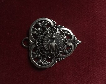 Gorgeous peacock part of a buckle or pendant