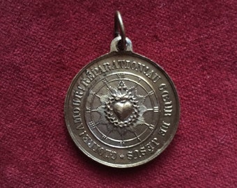 Sacred heart brass medal