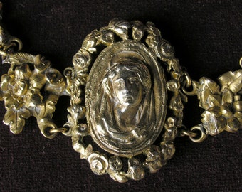 Fabulous religious brass bracelet with a cameo of Mary