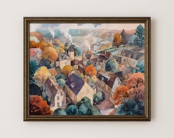 May include: Watercolor painting of a village scene in a gold-toned frame. The artwork depicts a town with buildings, trees, and a bridge, rendered in warm autumn colors. The painting has a vintage aesthetic.