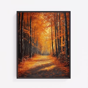 May include: A framed landscape painting depicts an autumn forest scene. Tall, dark tree trunks line a path, with vibrant orange and yellow foliage overhead. The path is covered in fallen leaves, and sunlight filters through the trees.