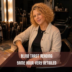 May include: A person with curly blonde hair wearing a beige button-down shirt over a black top, seated at a table with tarot cards. The text on the image reads BLIND TAROT READING SAME HOUR-VERY DETAILED in white capital letters on a dark red bar.