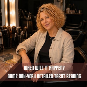 May include: A person with curly blonde hair wearing a beige button-down shirt over a black top, sitting at a desk with tarot cards. The text reads: WHEN WILL IT HAPPEN? SAME DAY-VERY DETAILED TAROT READING. The setting includes hair styling tools.