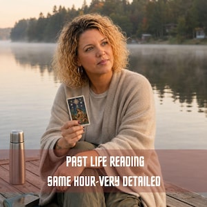 May include: A person with curly blonde hair wearing a beige cardigan and olive green pants holds a tarot card. A silver thermos and a stack of books sit nearby. The text on the image reads: PAST LIFE READING SAME HOUR-VERY DETAILED.