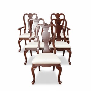 May include: A set of three ceramic mugs with a speckled, matte finish. The mugs are in shades of cream, light gray, and dark gray. Each mug has a simple, minimalist design and a rounded handle. Perfect for coffee or tea.