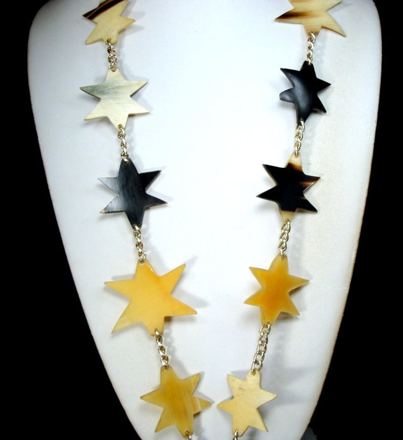 The 6 Pt Stars are A Handsome Array Of Natural Colors LONG Buffalo HORN Stars /& EAGLE Pendant on Gold Chain Necklace Tan to black