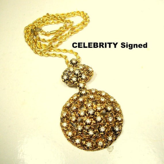 Signed Celebrity, 1970s Rhinestone Pendant Necklace: Gold Metal Medieval Amulet