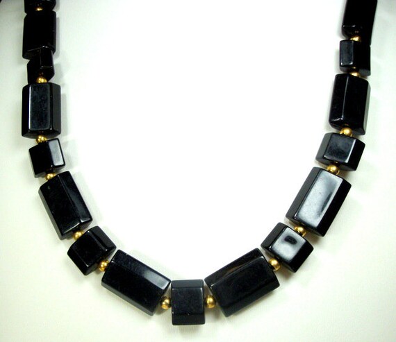 beautifully sparkling timelessly elegant with black faceted Lucite beads decorated vintage 1970s necklace Light