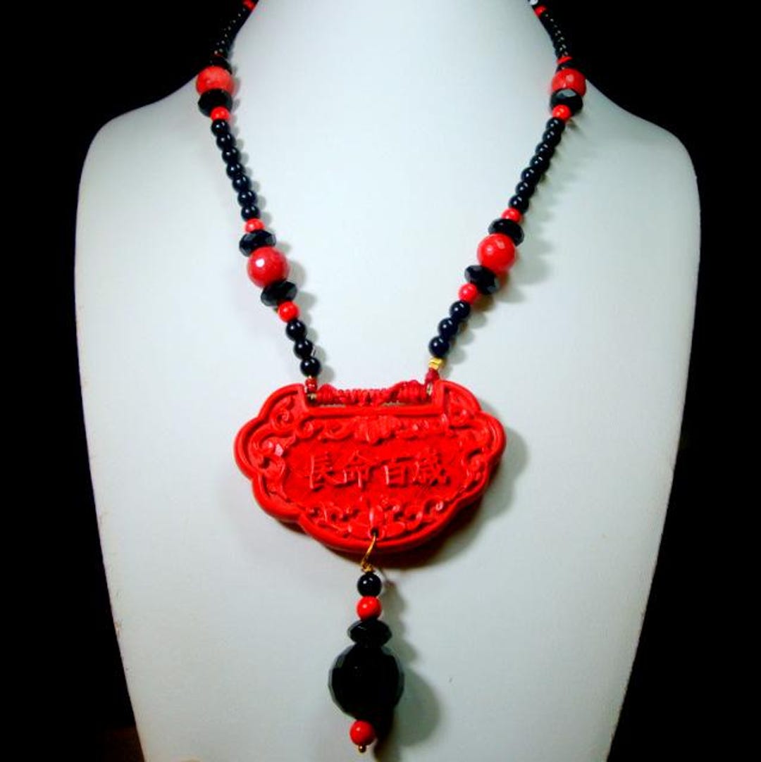 Carved Cinnabar Pendant Necklace: Red Coral & Black Glass Beads