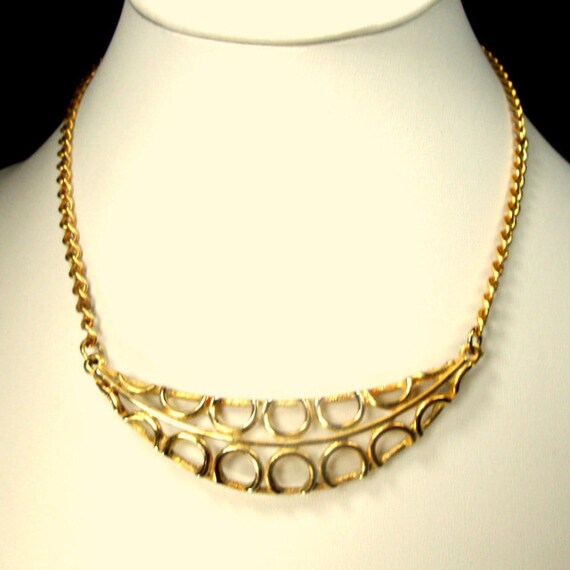 Tiny Goldtone Metal  Loop de Loop Crescent Bib on… - image 4