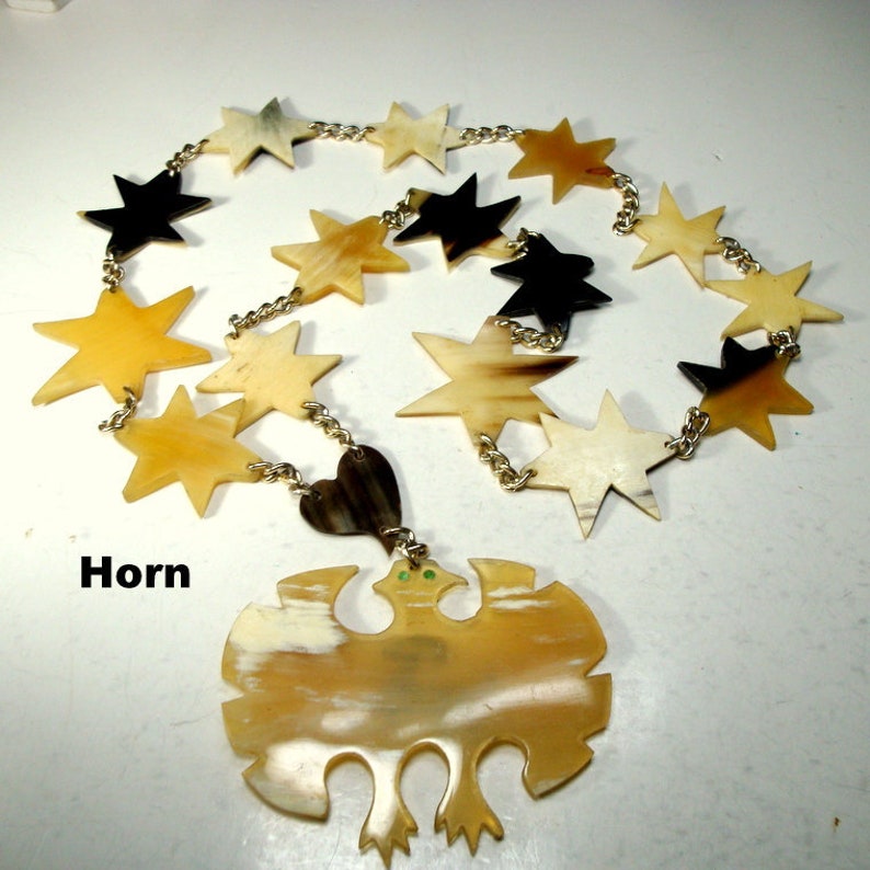 The 6 Pt Stars are A Handsome Array Of Natural Colors LONG Buffalo HORN Stars /& EAGLE Pendant on Gold Chain Necklace Tan to black