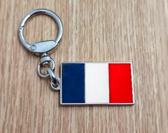 Flag France keychain pendant Metal enamel color classic flags of countries. Ring with rotating spring. Keychain for gift.