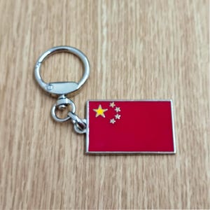 Flag China keychain pendant Metal enamel color classic flags of countries. Ring with rotating spring. Keychain for gift.