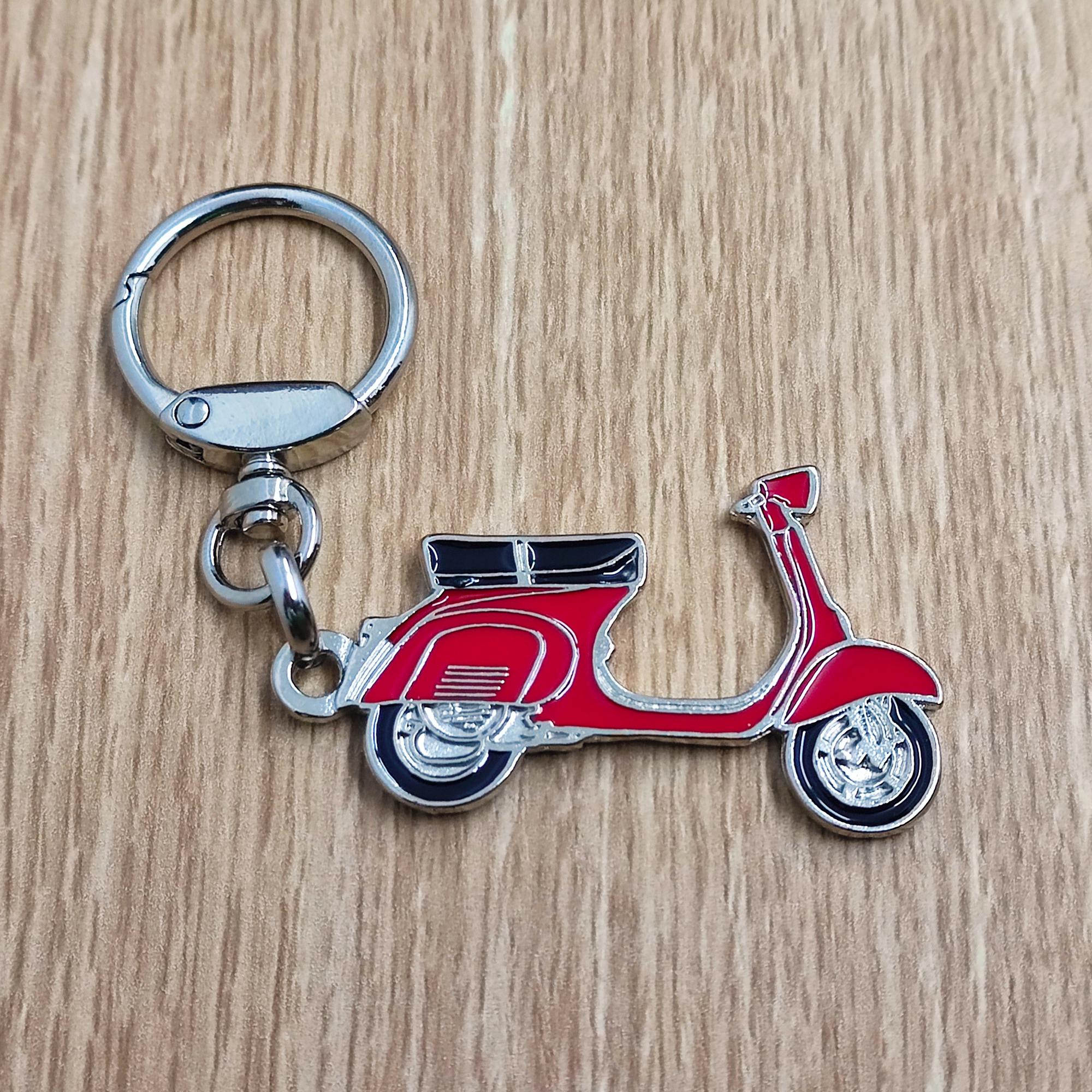 Vespa motorbike red, yellow keychain Metal enamel classic motorcycle collection. Ring with rotating spring. Keychain to give as a gift.