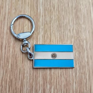 Flag Argentina keychain pendant Metal enamel color classic flags of countries. Ring with rotating spring. Keychain for gift.