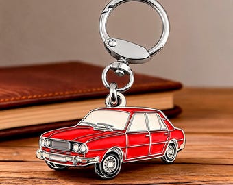 May include: A metal keychain featuring a red sedan car charm with white windows and silver-toned trim. The car is attached to a circular silver metal split ring by a small jump ring and a swivel connector, creating a functional accessory for keys.