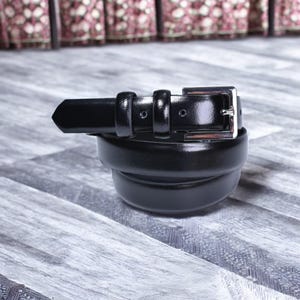 Leather black thin belt for women, classic style with silver colour buckle