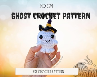 May include: A crochet pattern for a white ghost wearing a purple and yellow witch hat. The pattern is titled "No Sew Ghost Crochet Pattern" and "PDF Crochet Pattern".