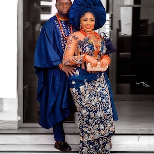 Traditionele Afrikaanse bruidsoutfit: korsetjurk Agbada-kant