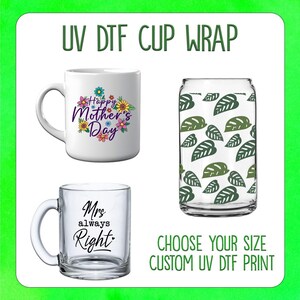 May include: Two white ceramic mugs with different designs. One mug has a floral design with the text "Happy Mother's Day". The other mug has the text "Mrs. always Right". A clear glass mug with a green leaf pattern is also shown.