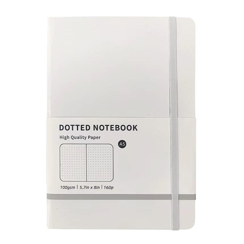 May include: A white A5 dotted notebook with a gray elastic closure. The cover features the text "DOTTED NOTEBOOK" and "High Quality Paper." The notebook is 5.7in x 8in and contains 160 pages.