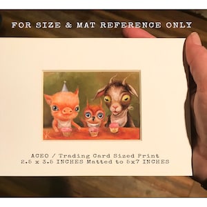 May include: A whimsical illustration of a pig, owl, and goat wearing party hats and holding cupcakes. The image is matted to 5x7 inches and measures 2.5 x 3.5 inches. ACEO / Trading Card Sized Print.
