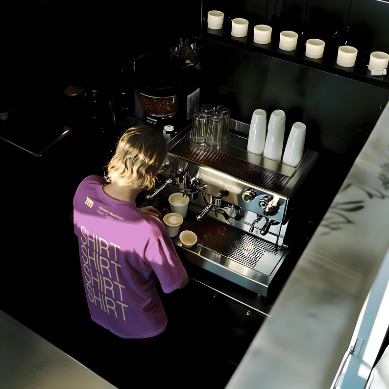 Cafe t-shirt barista mockup in a realistic cafe scene with editable PSD layers, perfect for branding design.