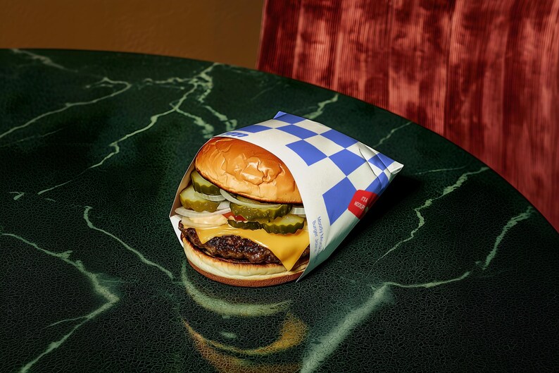 Fast Food Burger and Fries Packaging mockup in a realistic scene with editable PSD layers, perfect for branding design