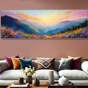 Peut inclure: Une peinture colorée d'un paysage de montagne avec une rivière serpentant à travers la vallée. Le ciel est d'un orange et d'un rose vifs, et les montagnes sont un mélange de bleu, de violet et de vert. La peinture est encadrée d'un cadre doré.