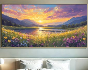May include: A framed landscape painting depicts a sunset over a valley with a river. The sky is a mix of orange, pink, and purple hues. The foreground features a field of wildflowers. The painting is displayed above a bed with white bedding.