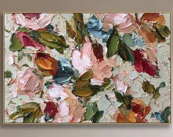 May include: An abstract floral painting in a gold frame. The artwork features textured brushstrokes in shades of pink, green, orange, and blue. The painting is displayed above a fireplace with a burning fire.