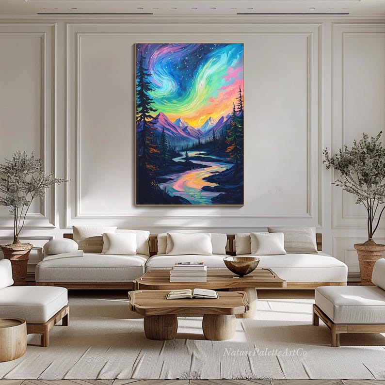 May include: A painting of a colorful aurora borealis over a mountain range and a river. The sky is a deep blue with streaks of pink, green, and yellow. The mountains are dark and silhouetted against the sky. The river is a light blue and winds through the valley.
