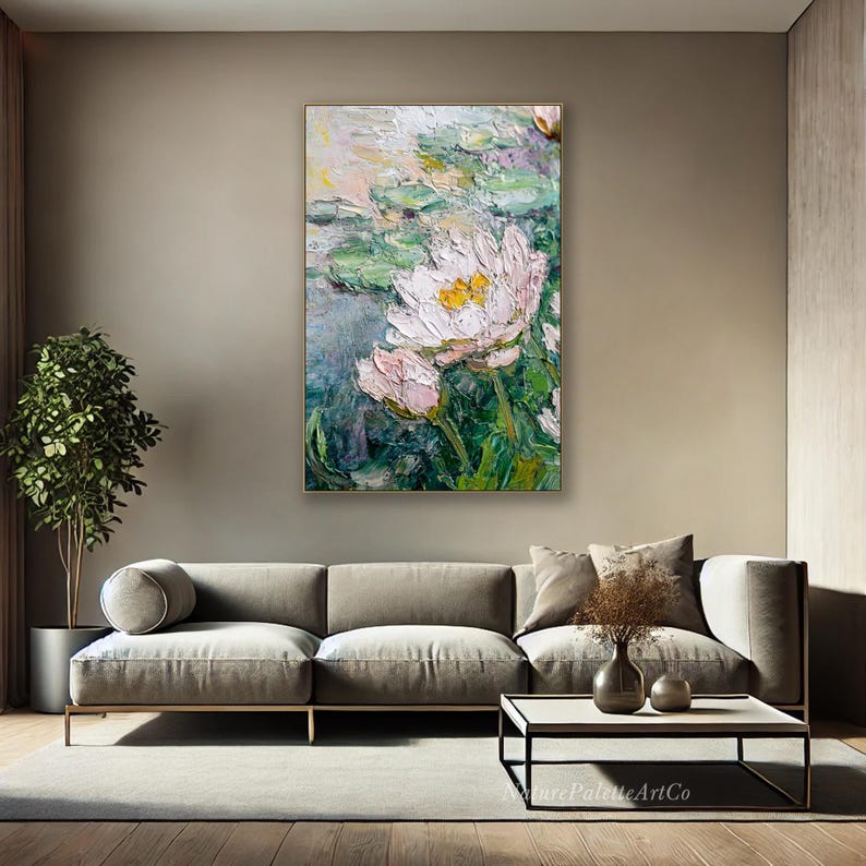 May include: An oil painting of white and yellow water lilies with green lily pads. The artwork has a textured, impressionistic style, with visible brushstrokes. The background features soft blues and greens.