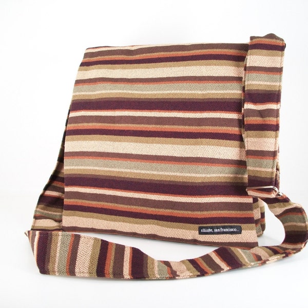MESSENGER BAG. Made in California. Hey duty fabric. Multiple pockets. Zippers.