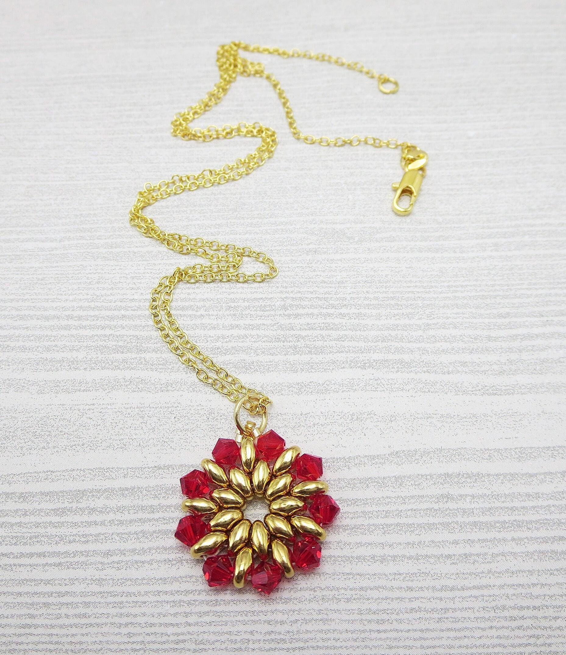 Gold Red Necklace on Check Inn to Christmas Movie Yolanda