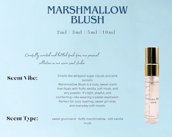 May include: A small glass bottle of Marshmallow Blush perfume with a gold cap. The bottle is labeled with the name of the scent and the size, 2 ml, 3 ml, 5 ml, and 10 ml. The scent description is: Smells like whipped sugar clouds and pink sunsets. Marshmallow Blush is a cozy, sweet scent that floats with fluffy vanilla, soft musk, and airy powder. It's light, playful, and comforting-like wearing a pastel daydream. Perfect for cozy layering, sweet girl eras, and everyday soft moods. Sweet gourmand - fluffy marshmallow - soft vanilla musk.