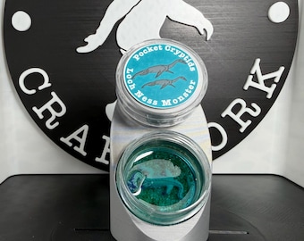 Nessie Pocket Cryptids Diorama With Stand (Black/White/Silver/Grey); Loch Ness Monster