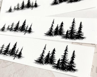 May include: Three rows of black silhouette pine trees on a white background. The trees are arranged in a line, with the tallest trees in the center and the shortest trees on the edges.