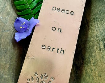 pace sulla terra - placca di passaggi in rame caldo - orientamento verticale