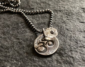 om - matte recycled sterling necklace with double terminated quartz