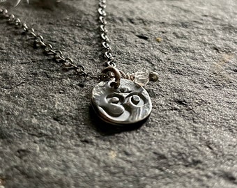 om - delicate matte recycled sterling necklace with double terminated quartz