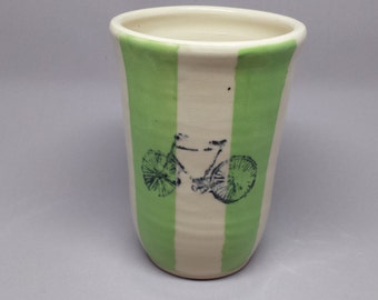 Green stripped tumbler with bicycle design